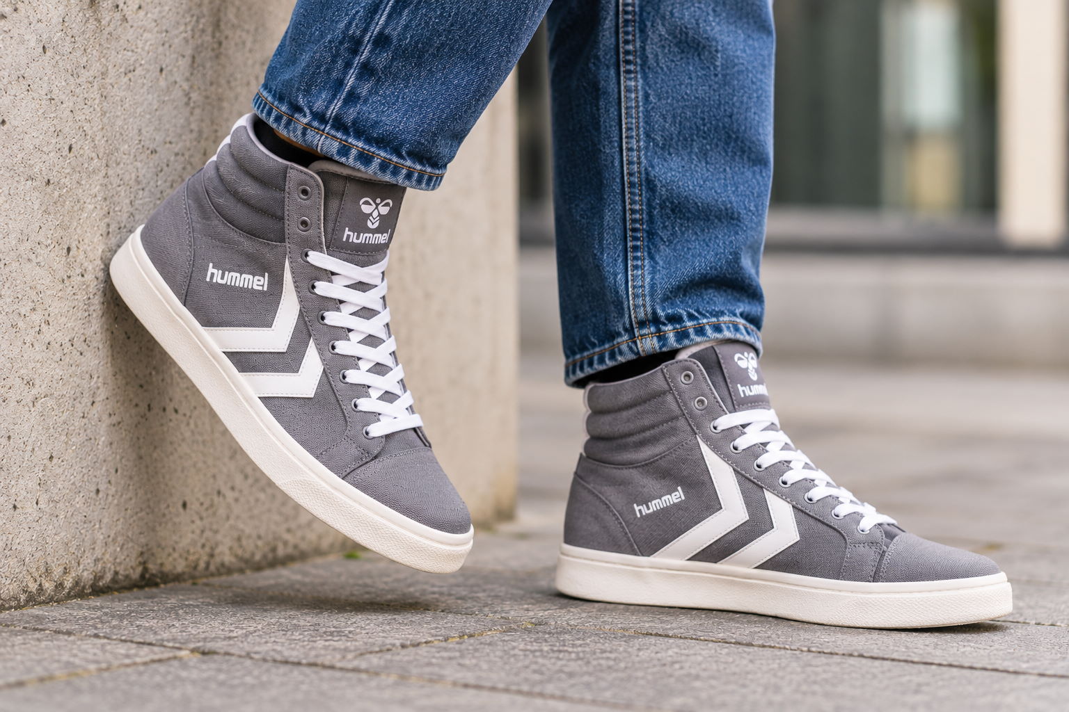 Grey Hummel High-Tops on Urban Steps